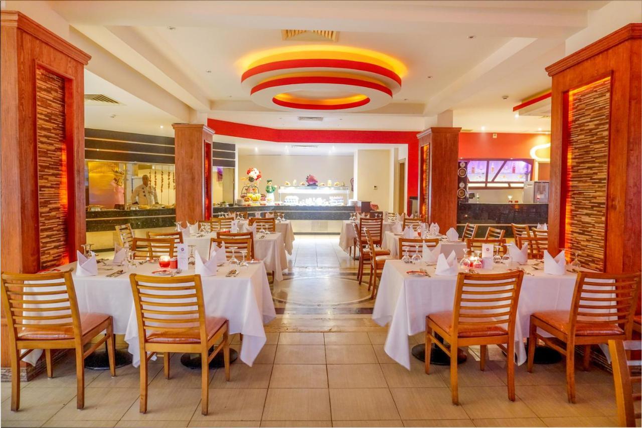 ホテル Charmillion Club Aquapark シャルム・エル・シェイク エクステリア 写真 The interior of the restaurant