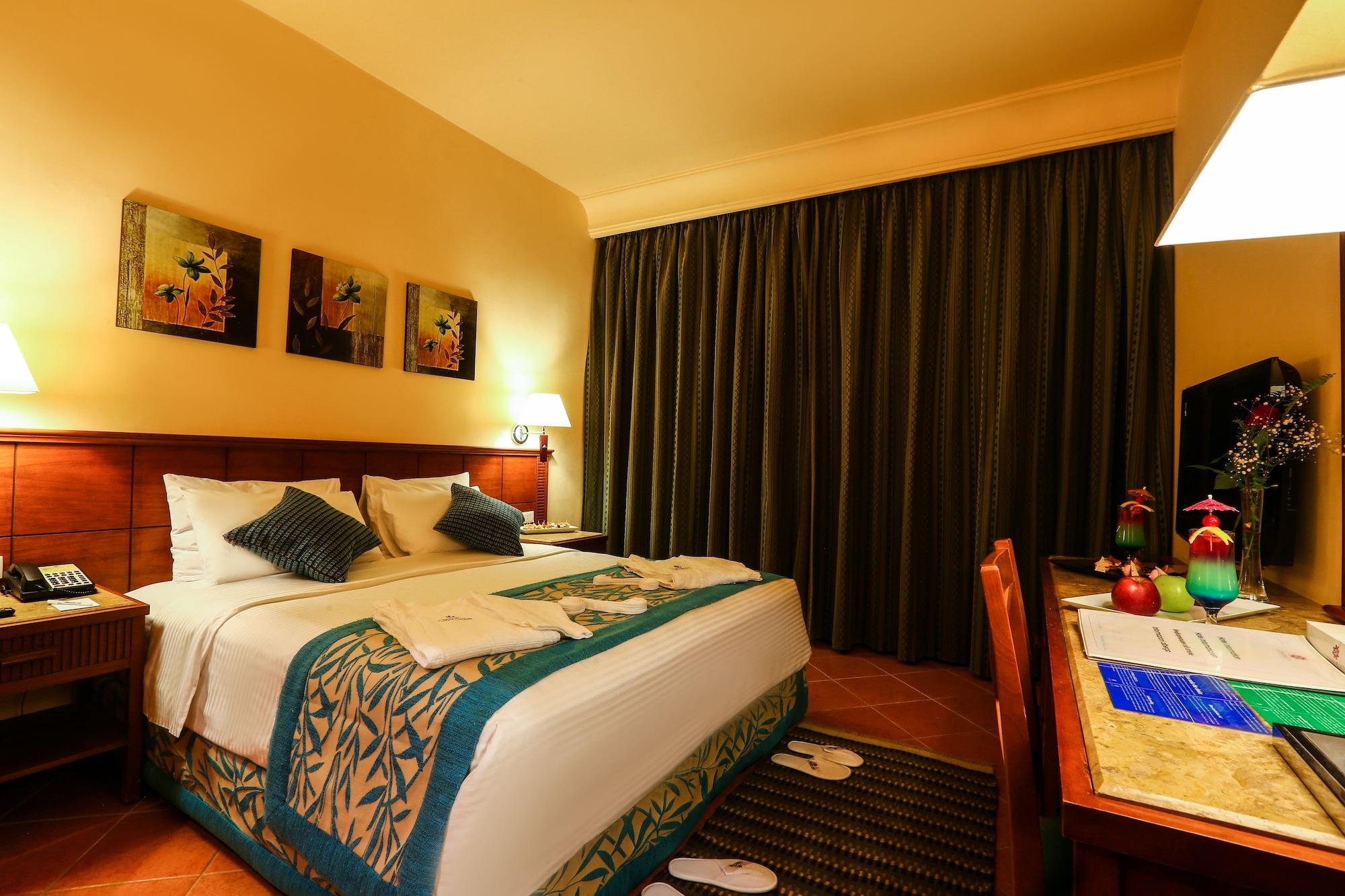 ホテル Charmillion Club Aquapark シャルム・エル・シェイク エクステリア 写真 A bedroom at the hotel
